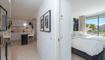 Resa Estates apartment for sale in Ibiza marina botafoch modern hallway and bedroom .jpg